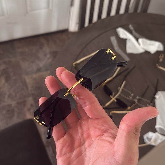 Cartier Black and Gold Rimless Sunglasses - Picture 1 of 3